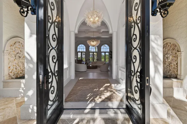 a view of a entryway door front of a house
