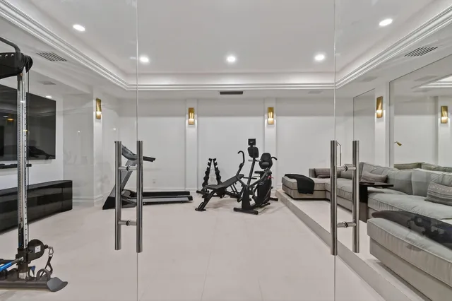 an aerial view of a house with a ocean view