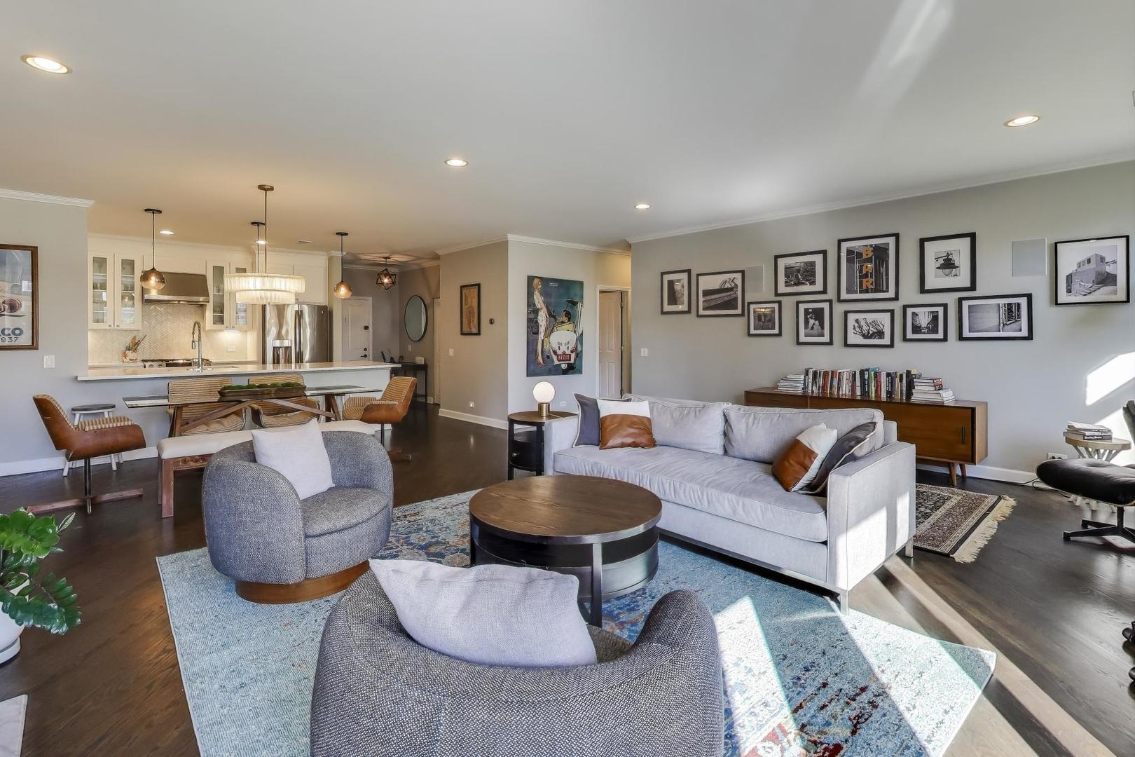 1414 North Wells Street, Unit 405 Chicago, IL 60610 - Photo 5 of 27 a living room with furniture potted plant and a table