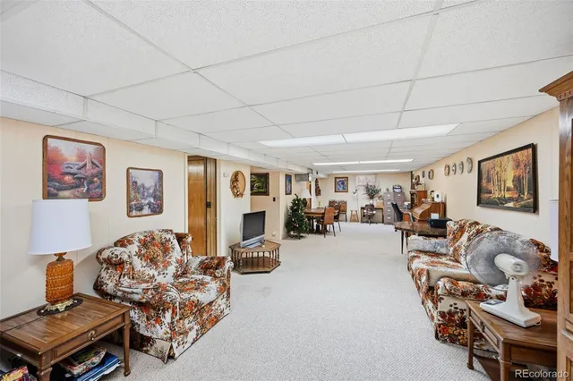 a bed room with a bed and a couch