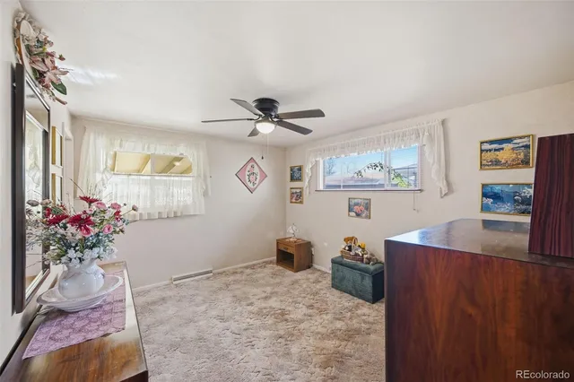 a workspace with furniture and window