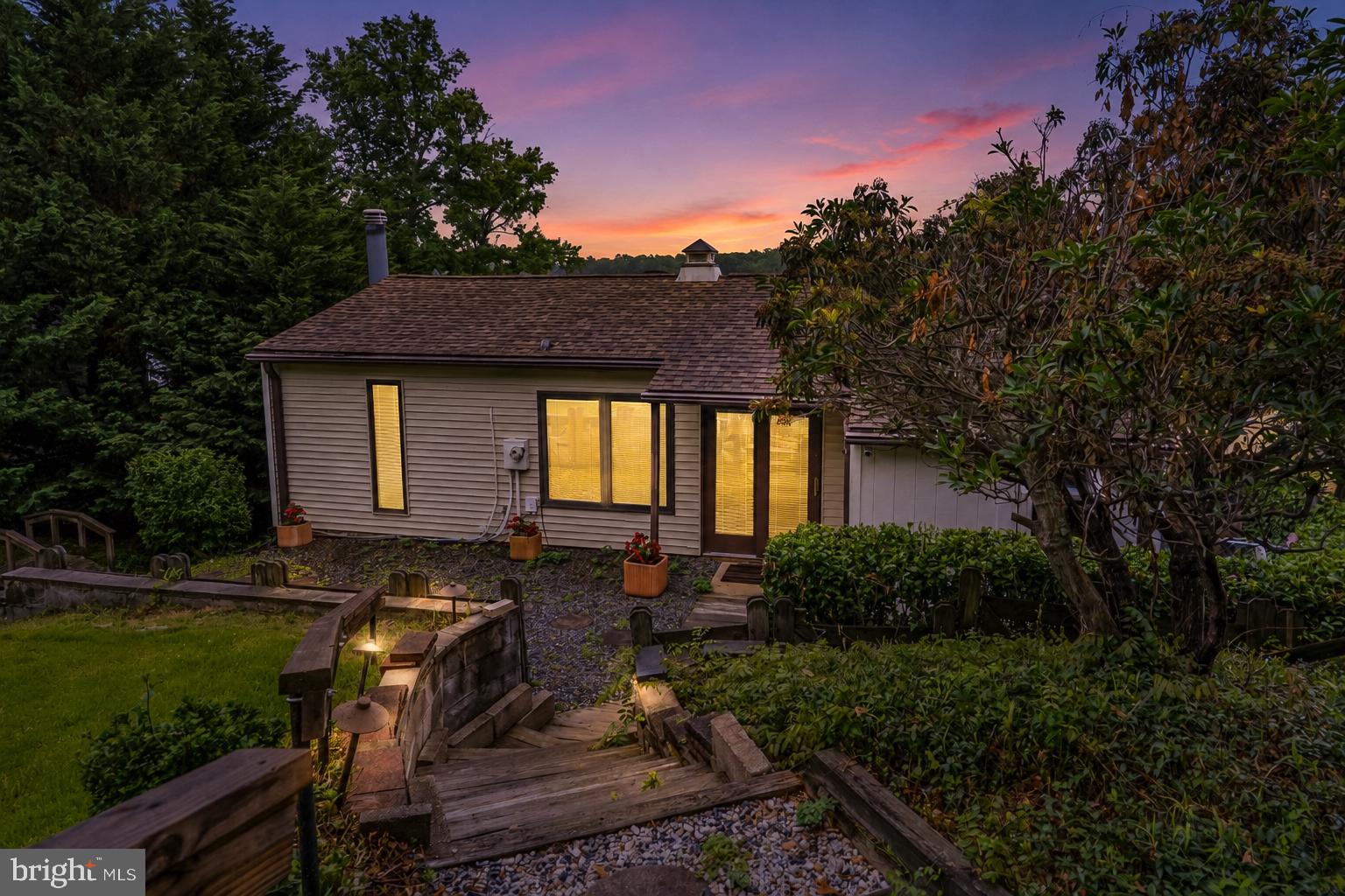 64 South Shore Road Elkton, MD 21921 - Photo 4 of 36 Serene home at dusk, nature's embrace.