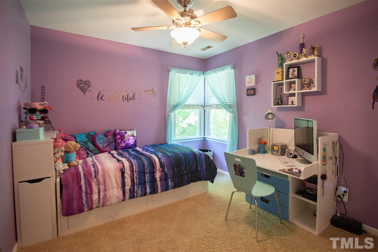 9720 Talman Court Raleigh, NC 27615 - Photo 22 of 30 An abundance of light shines through the large corner window.