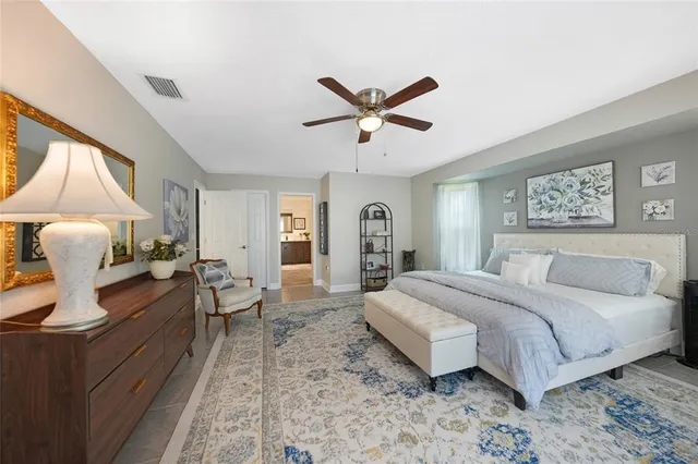 a spacious bathroom with a double vanity sink mirror and double