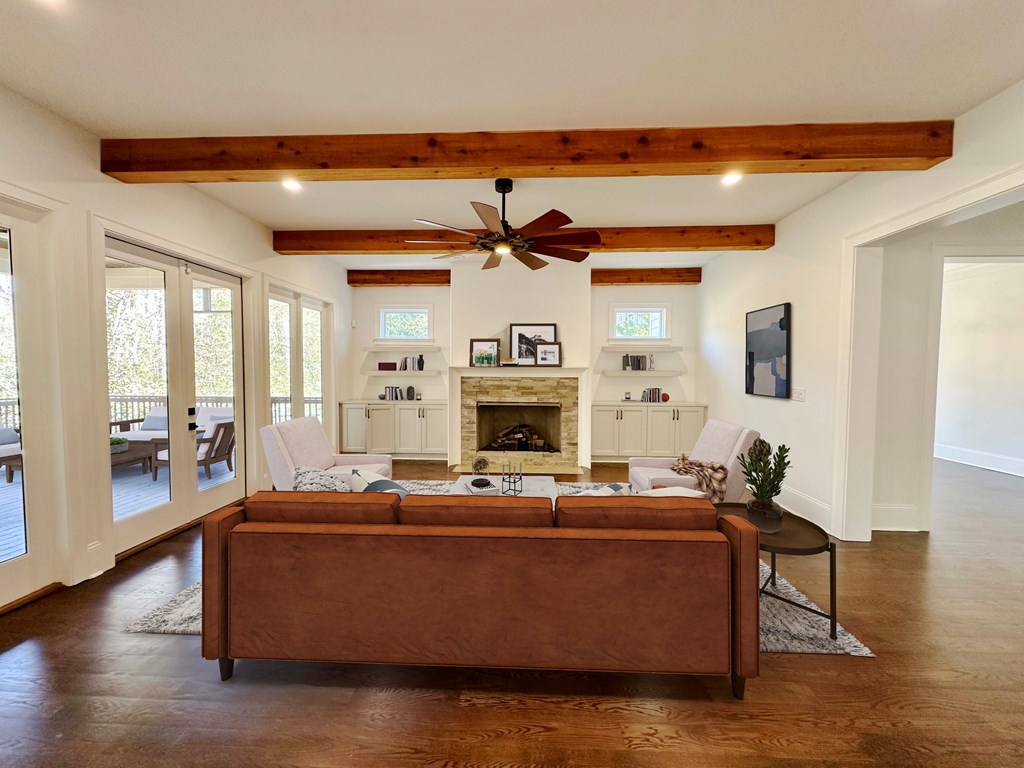 906 Winall Down Road Northeast Atlanta, GA 30319 - Photo 28 of 87 a living room with fireplace furniture and a wooden floor