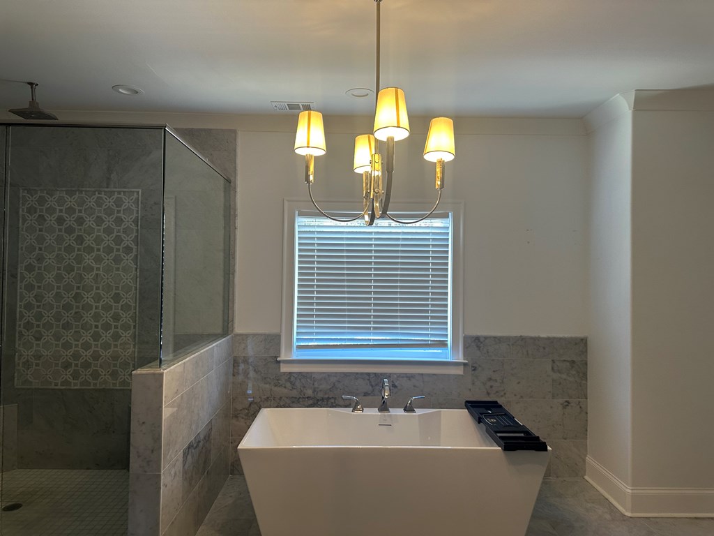906 Winall Down Road Northeast Atlanta, GA 30319 - Photo 54 of 87 a bathroom with a sink a toilet and a mirror