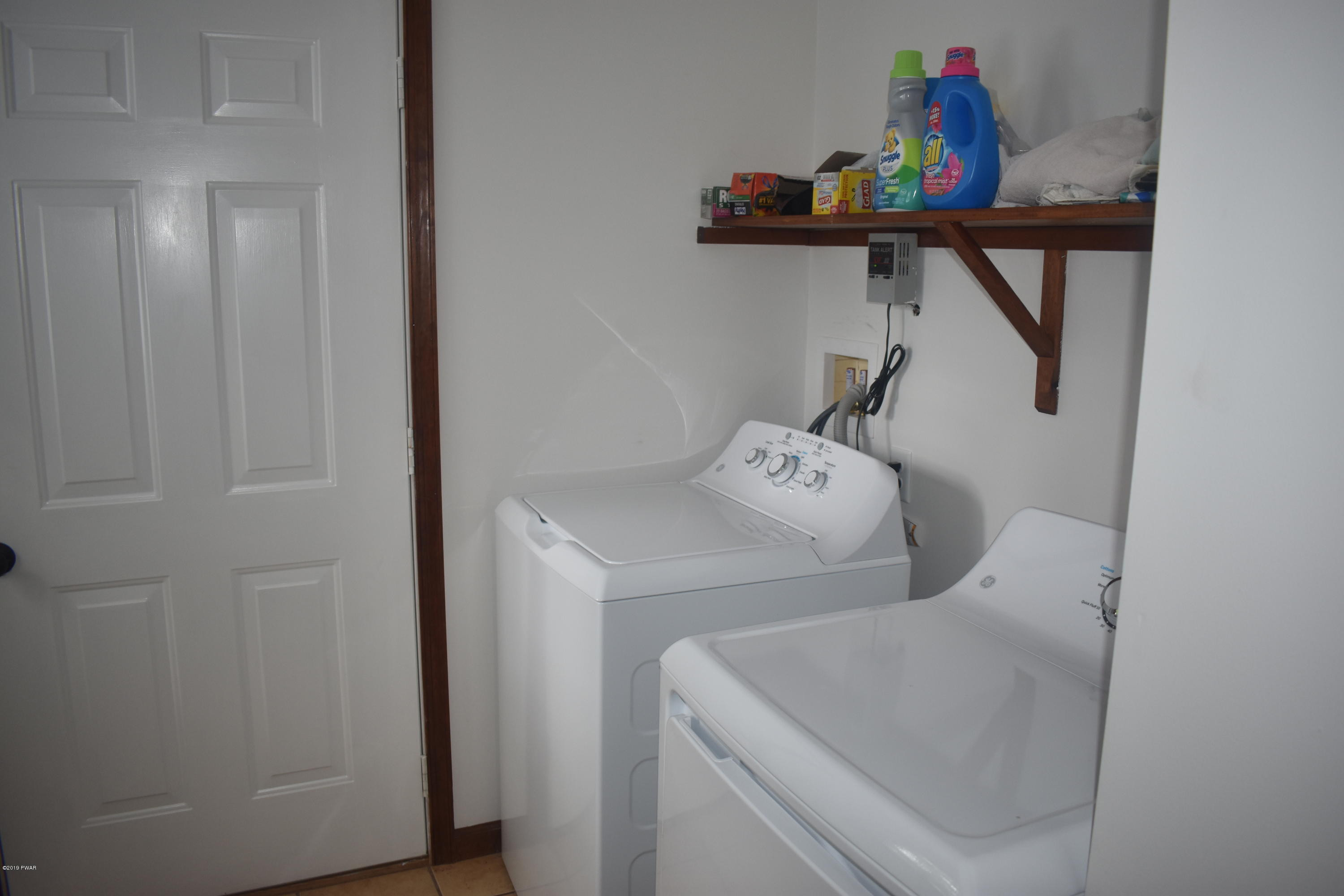 105 Rodeo Drive Hawley, PA 18428 - Photo 15 of 42 a utility room with dryer and washer