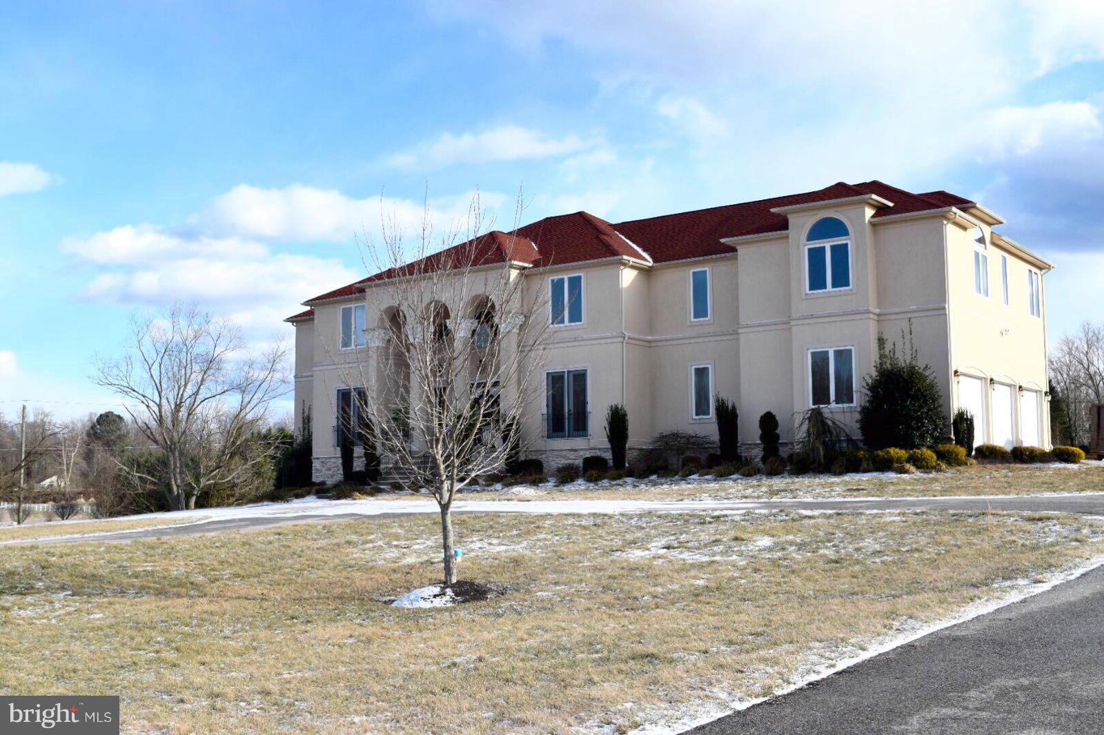 13901 Candy Hill Road Upper Marlboro, MD 20772 - Photo 2 of 20 a front view of a house with a yard