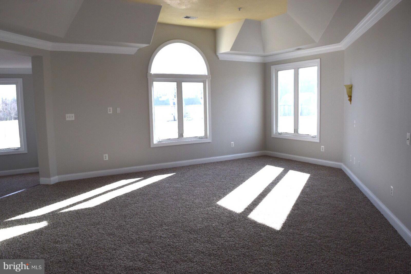 13901 Candy Hill Road Upper Marlboro, MD 20772 - Photo 11 of 20 an empty room with windows