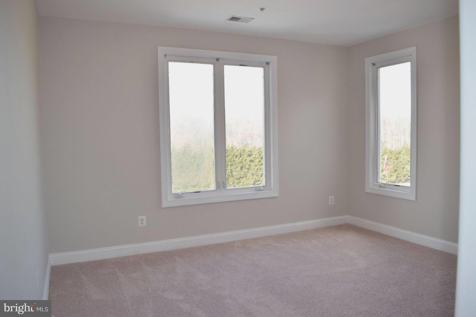 13901 Candy Hill Road Upper Marlboro, MD 20772 - Photo 17 of 20 an empty room with a window