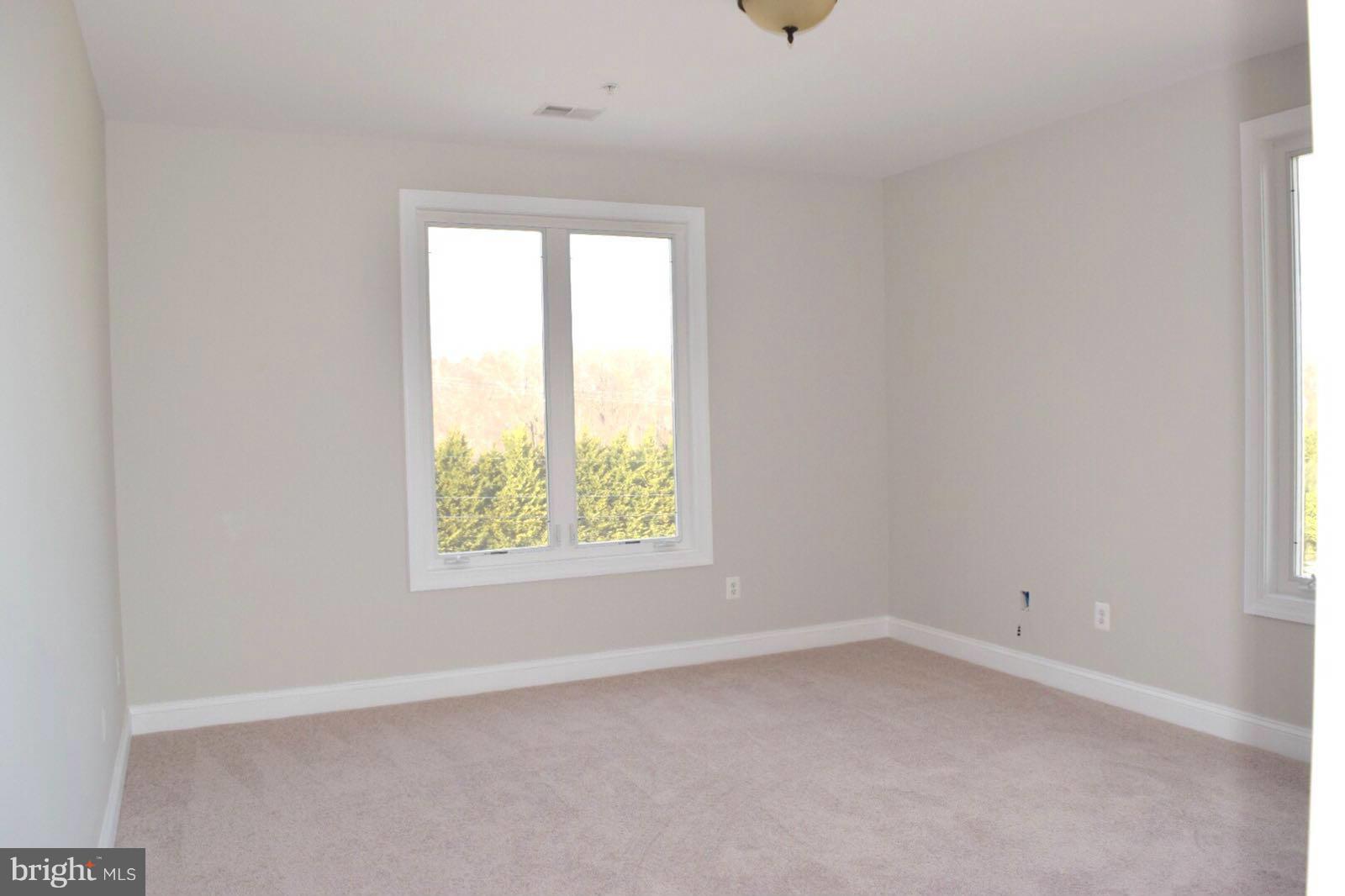13901 Candy Hill Road Upper Marlboro, MD 20772 - Photo 19 of 20 an empty room with a window