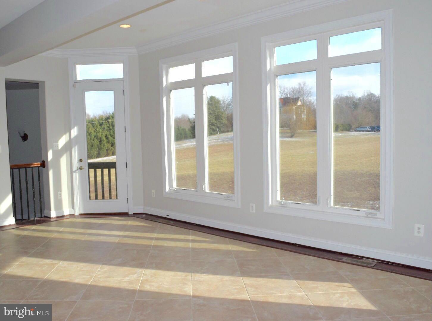 13901 Candy Hill Road Upper Marlboro, MD 20772 - Photo 6 of 20 an empty room with a window