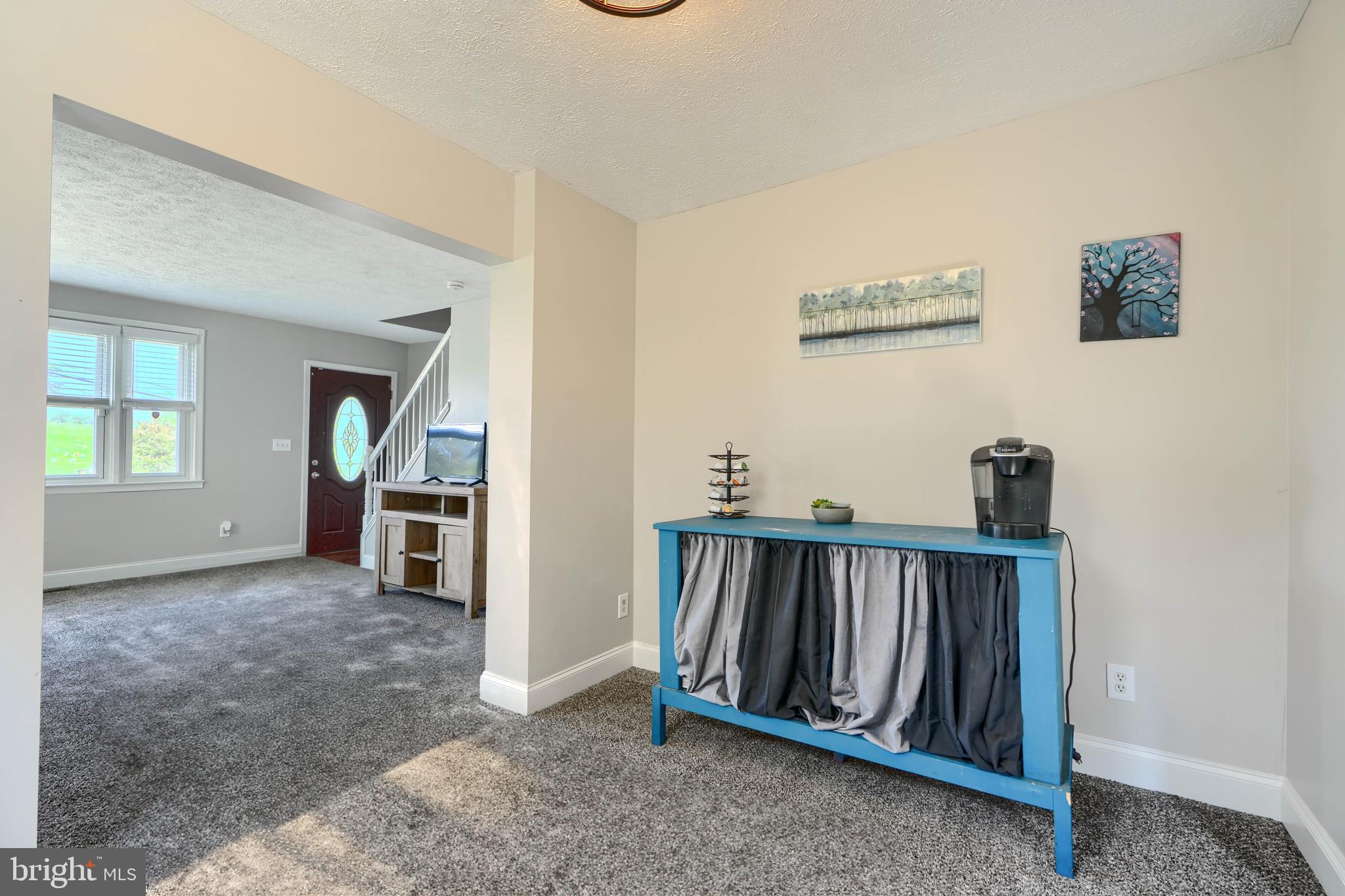 5221 Trumps Mill Road Baltimore, MD 21206 - Photo 12 of 53 a view of a hallway with workspace