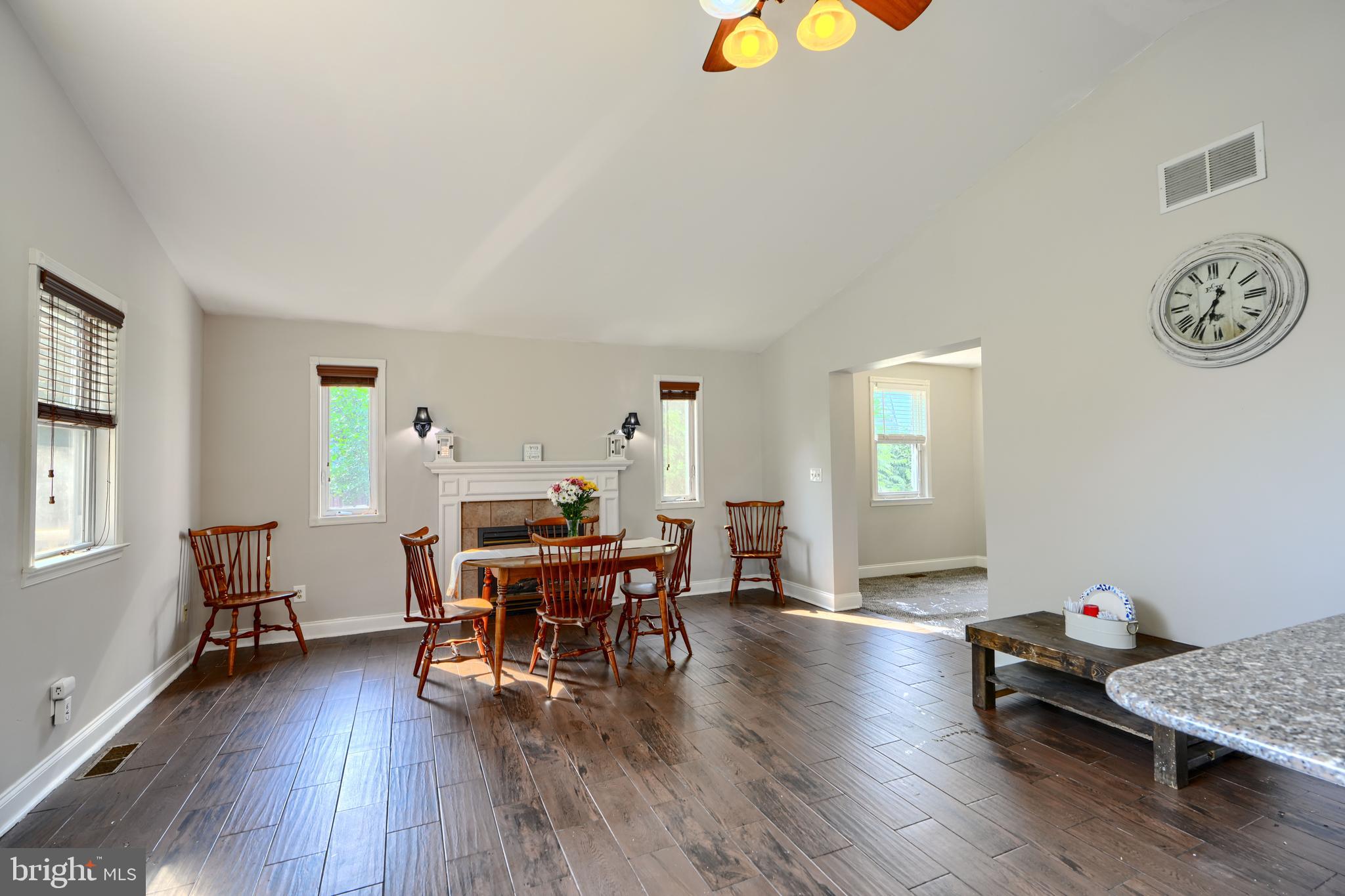 5221 Trumps Mill Road Baltimore, MD 21206 - Photo 14 of 53 a view of a dining room with furniture and wooden floor