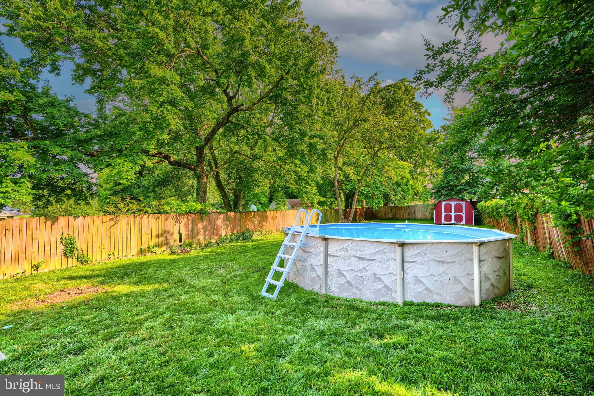 5221 Trumps Mill Road Baltimore, MD 21206 - Photo 43 of 53 a backyard of a house with lots of green space