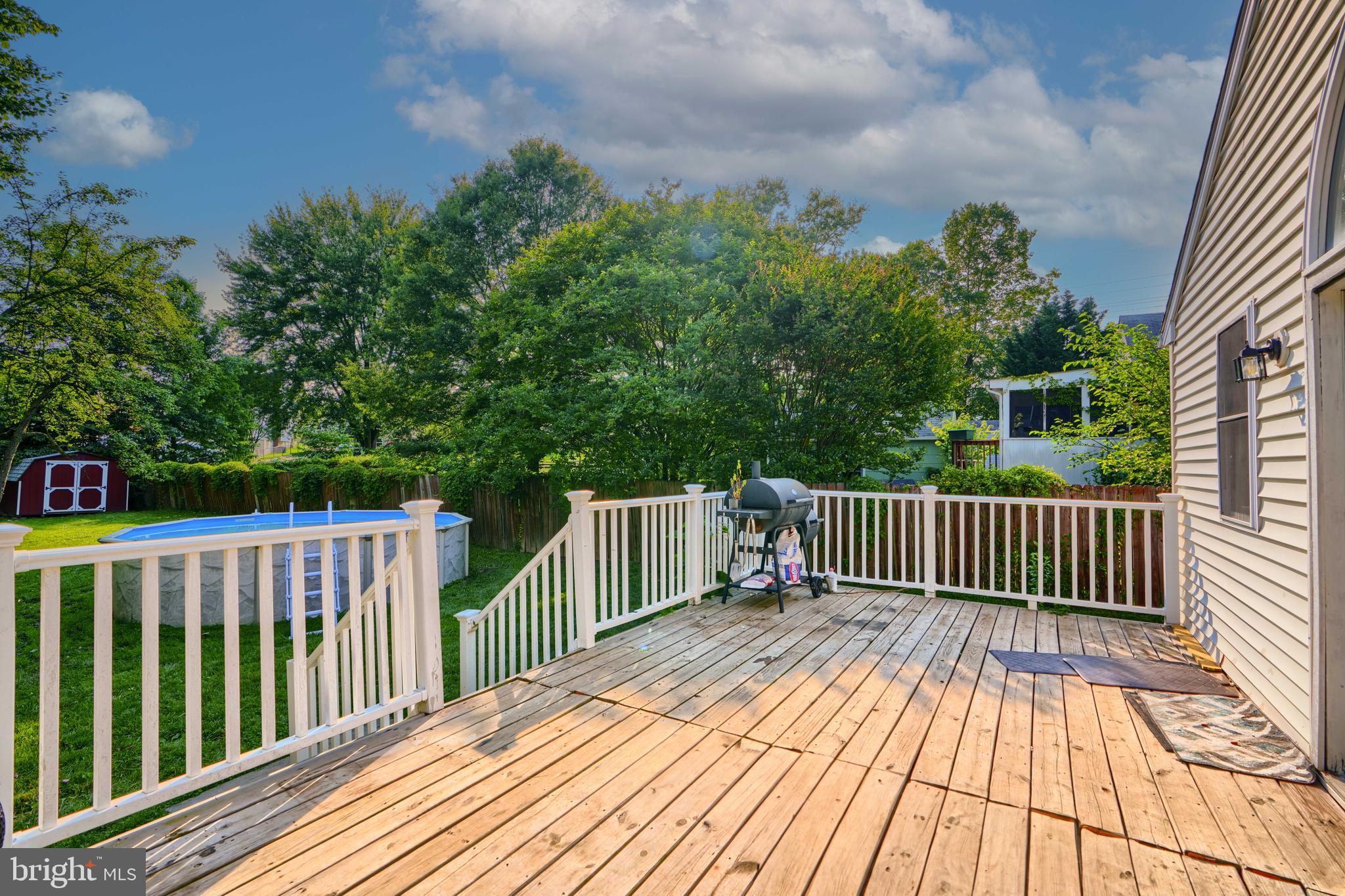 5221 Trumps Mill Road Baltimore, MD 21206 - Photo 45 of 53 a view of a wooden roof deck