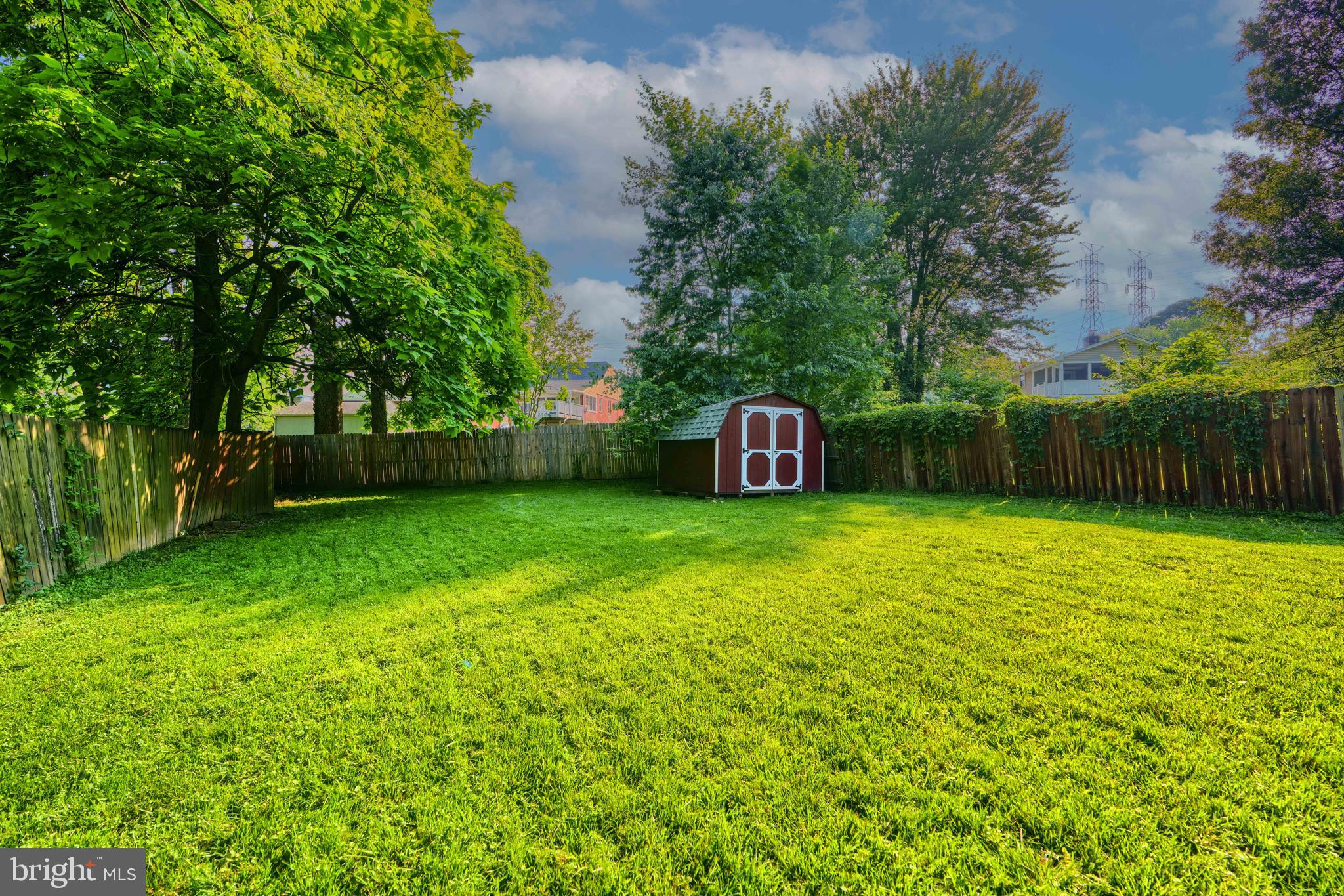 5221 Trumps Mill Road Baltimore, MD 21206 - Photo 47 of 53 a front view of a house with a garden