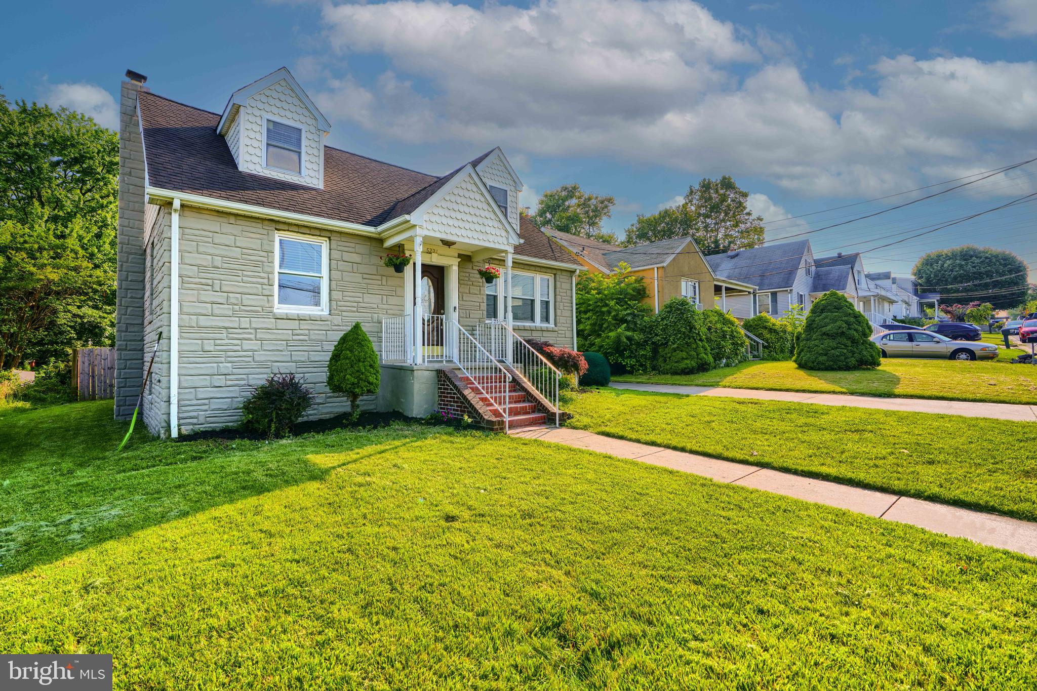 5221 Trumps Mill Road Baltimore, MD 21206 - Photo 52 of 53 a view of a house with a yard