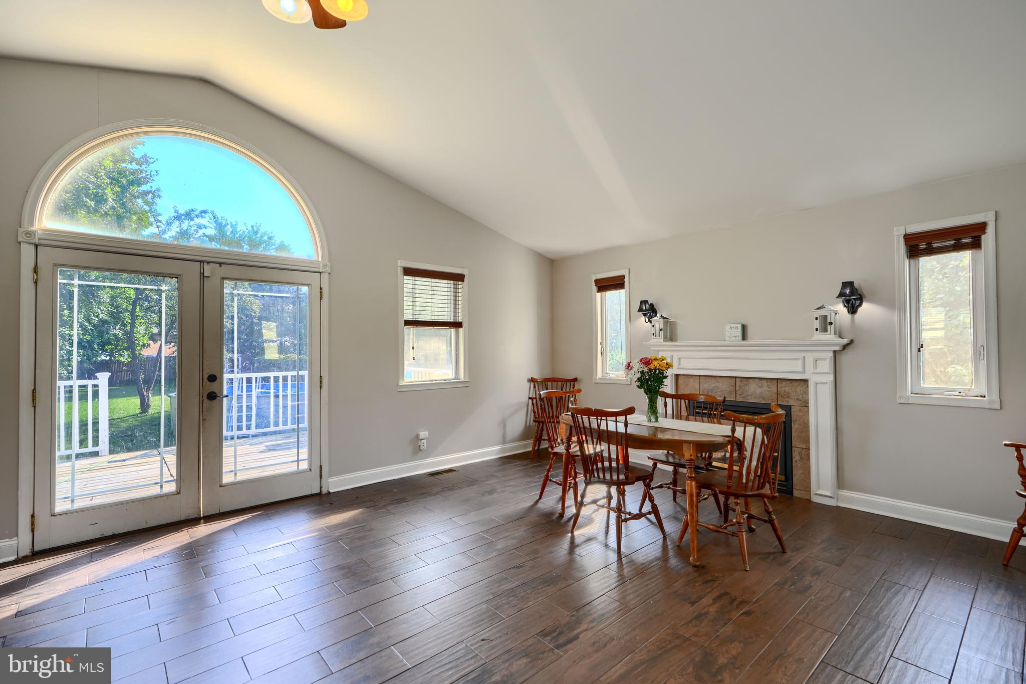 5221 Trumps Mill Road Baltimore, MD 21206 - Photo 6 of 53 a view of a dining room with furniture and wooden floor