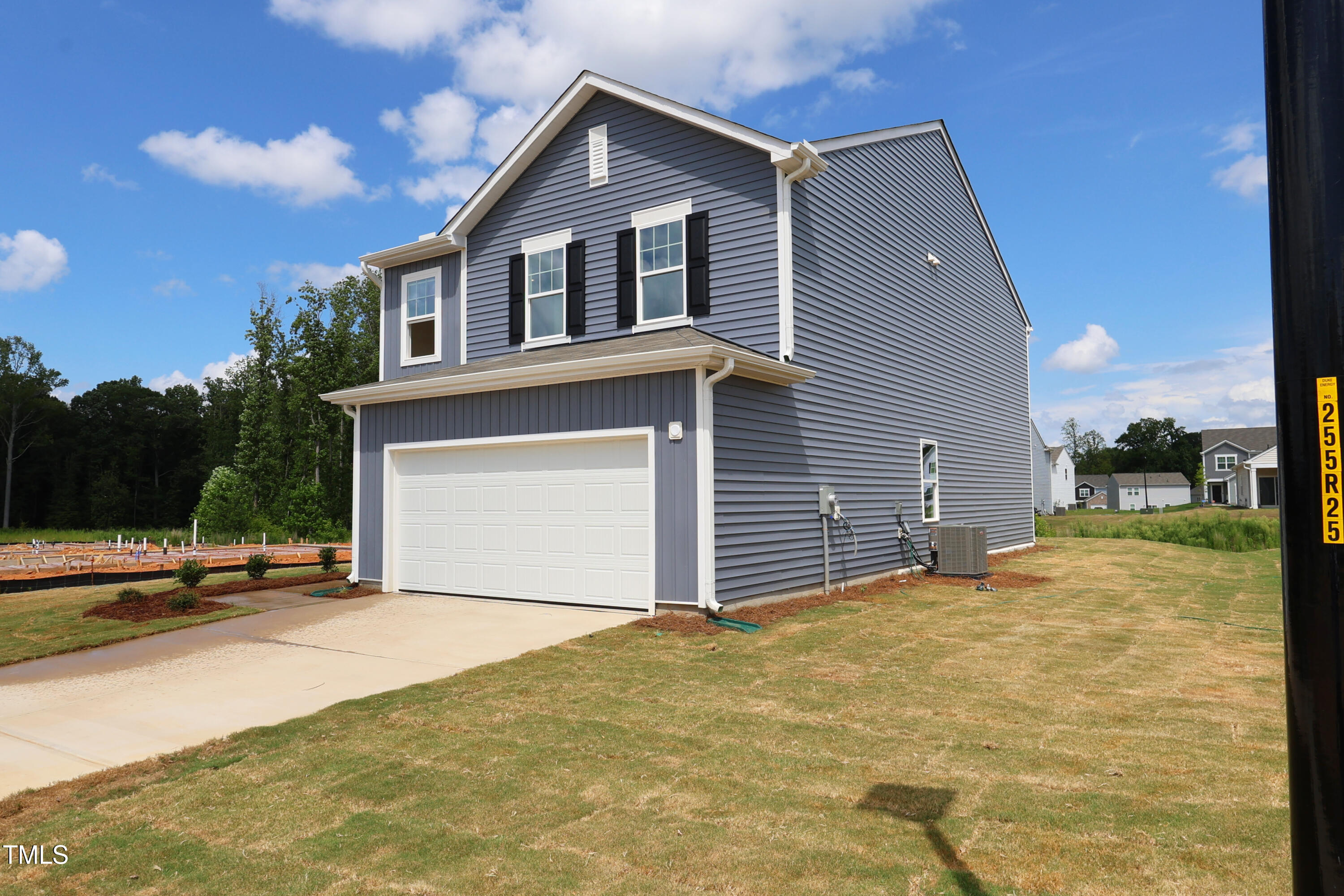 851 Embraer Way Spring Spring Hope, NC 27882 - Photo 6 of 25 a front view of a house with a yard