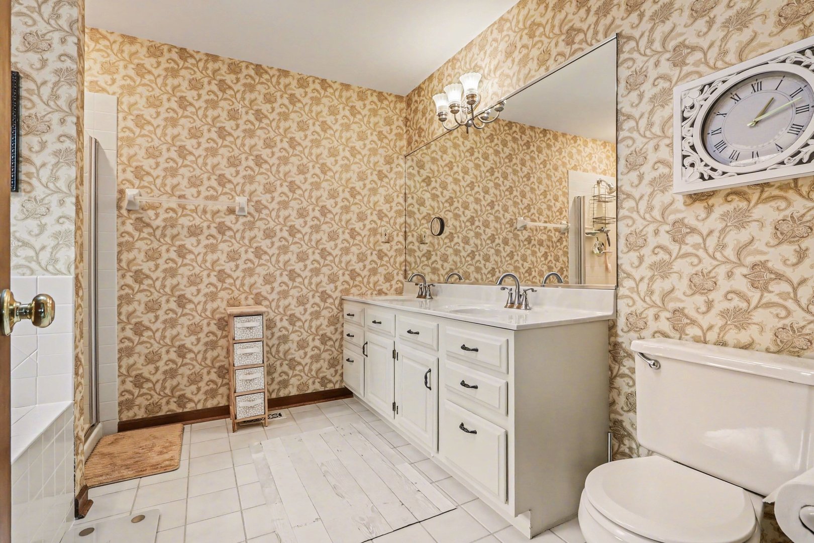 570 Violet Lane Batavia, IL 60510 - Photo 18 of 28 a bathroom with a sink a toilet and shower