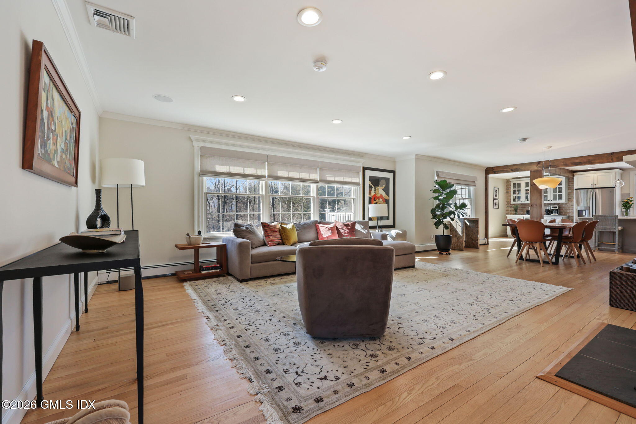 97 Davenport Ridge Lane Stamford, CT 06903 - Photo 7 of 31 a living room with furniture large window and wooden floor