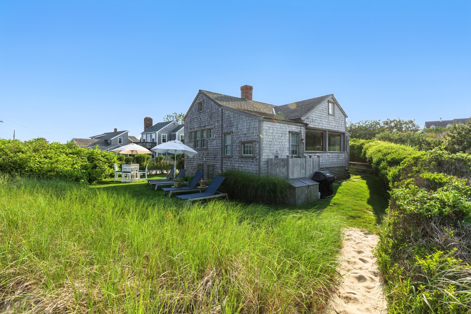 3 North Gully Road Nantucket, MA 02554 - Photo 3 of 43 a view of a house with a big yard and a fountain