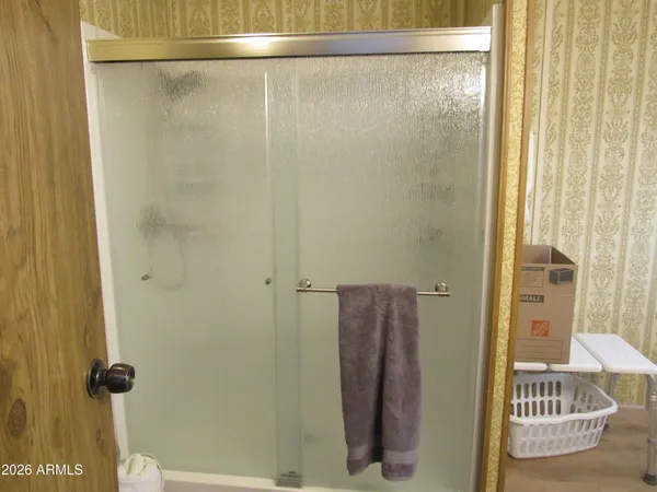 a bathroom with a sink and mirror