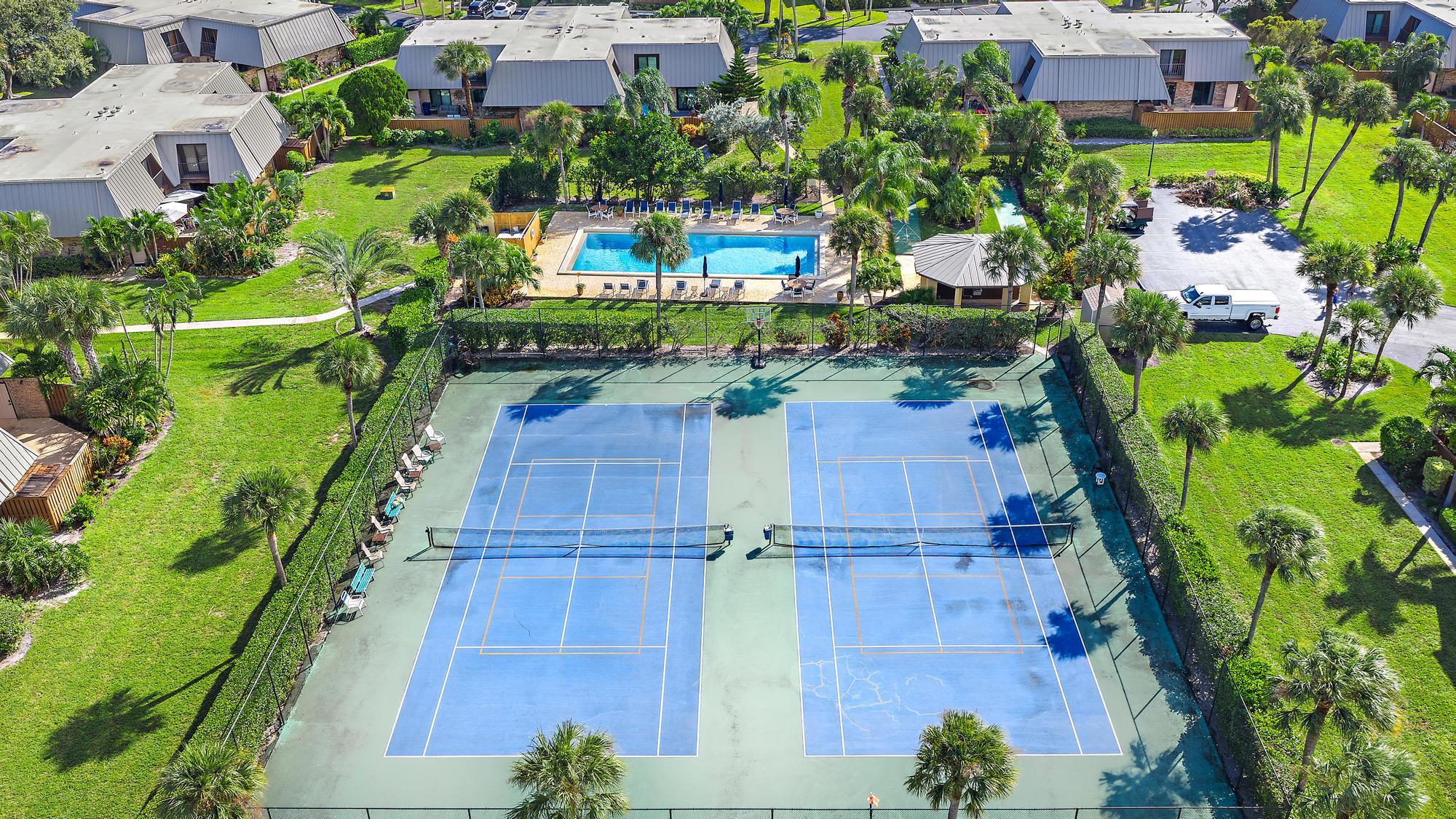 1420 Ocean Way, Unit 30C Jupiter, FL 33477 - Photo 21 of 25 a view of a yard with plants