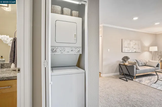 a view of living room washer and dryer