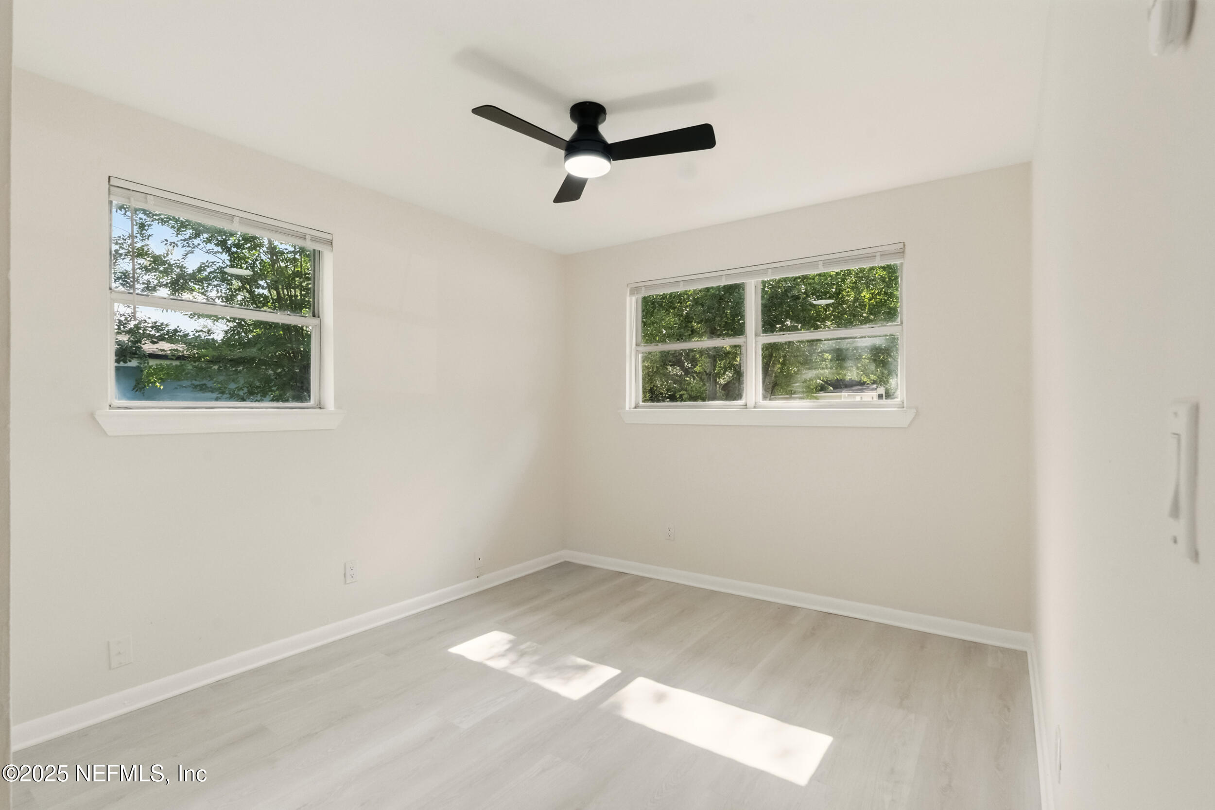 3903 Macgregor Drive Jacksonville, FL 32210 - Photo 28 of 49 an empty room with a window
