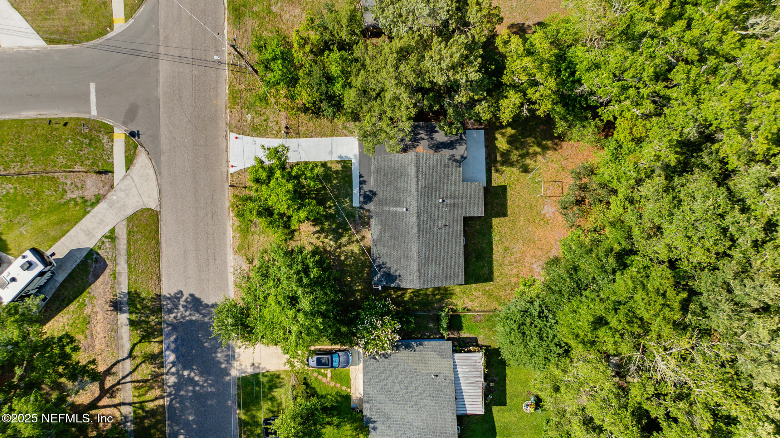 3903 Macgregor Drive Jacksonville, FL 32210 - Photo 39 of 49 an aerial view of a house with a yard