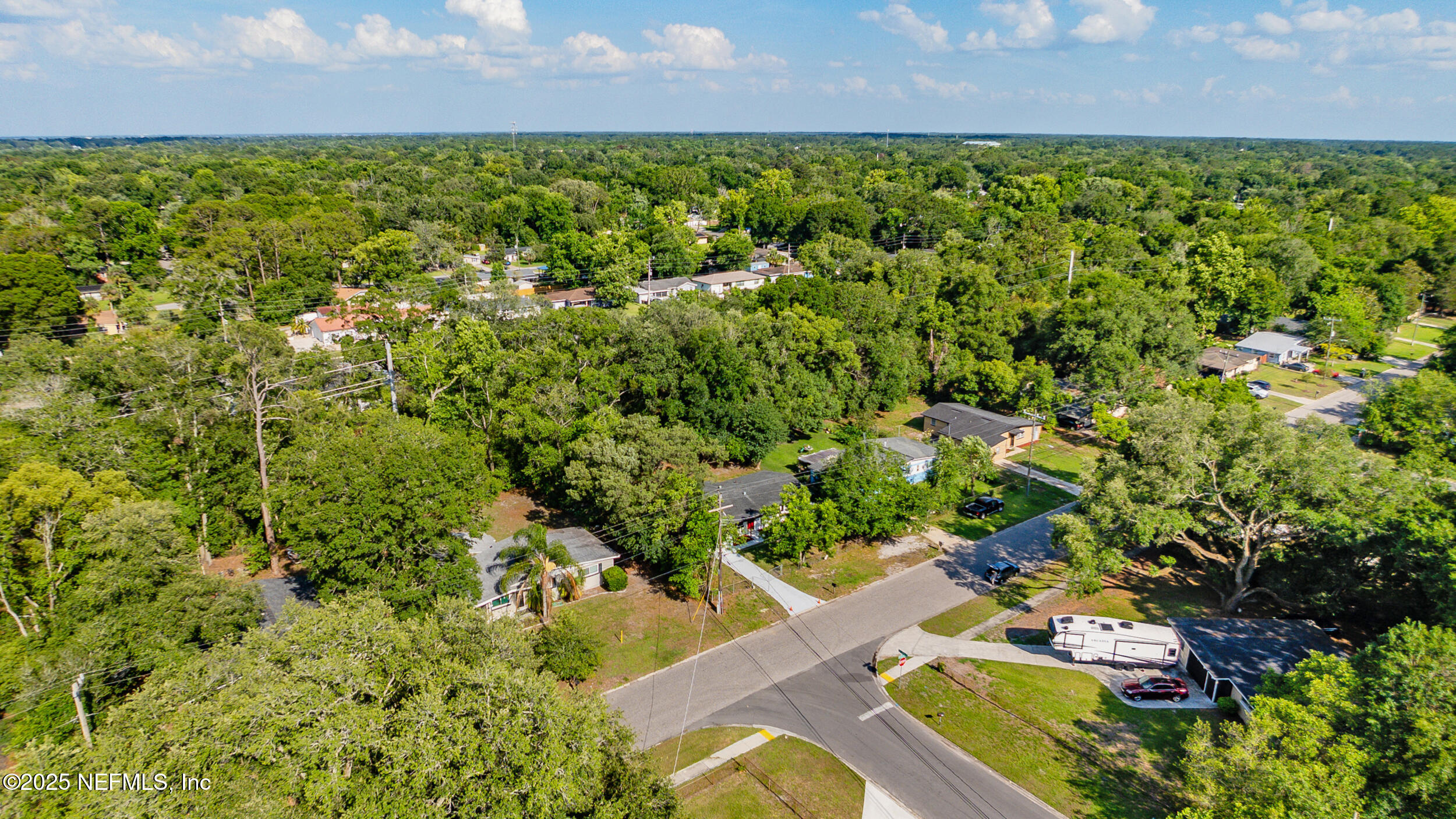 3903 Macgregor Drive Jacksonville, FL 32210 - Photo 47 of 49 view of a lake with houses