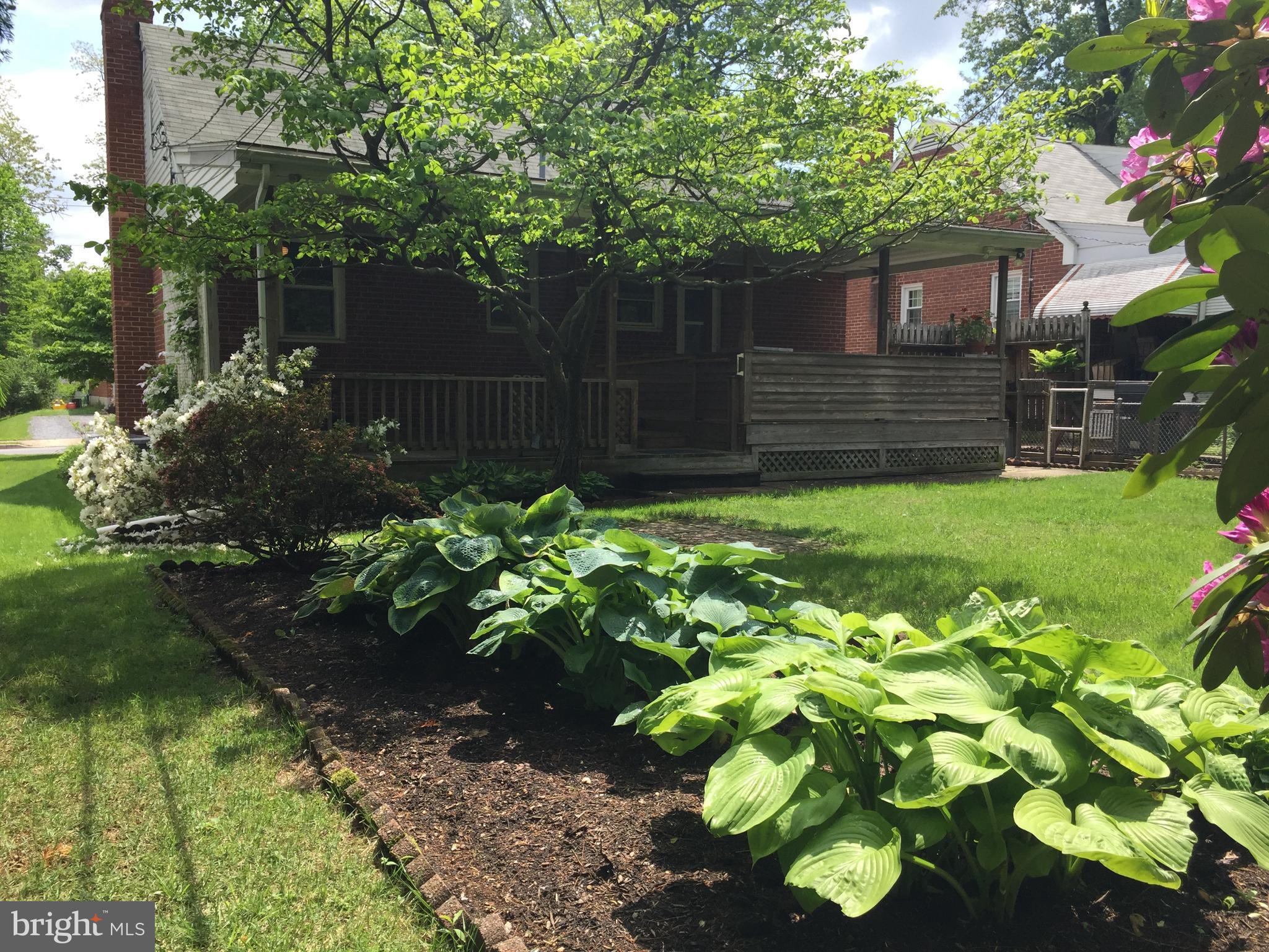 602 Woodside Road Baltimore, MD 21208 - Photo 2 of 30 Gardens and private back deck