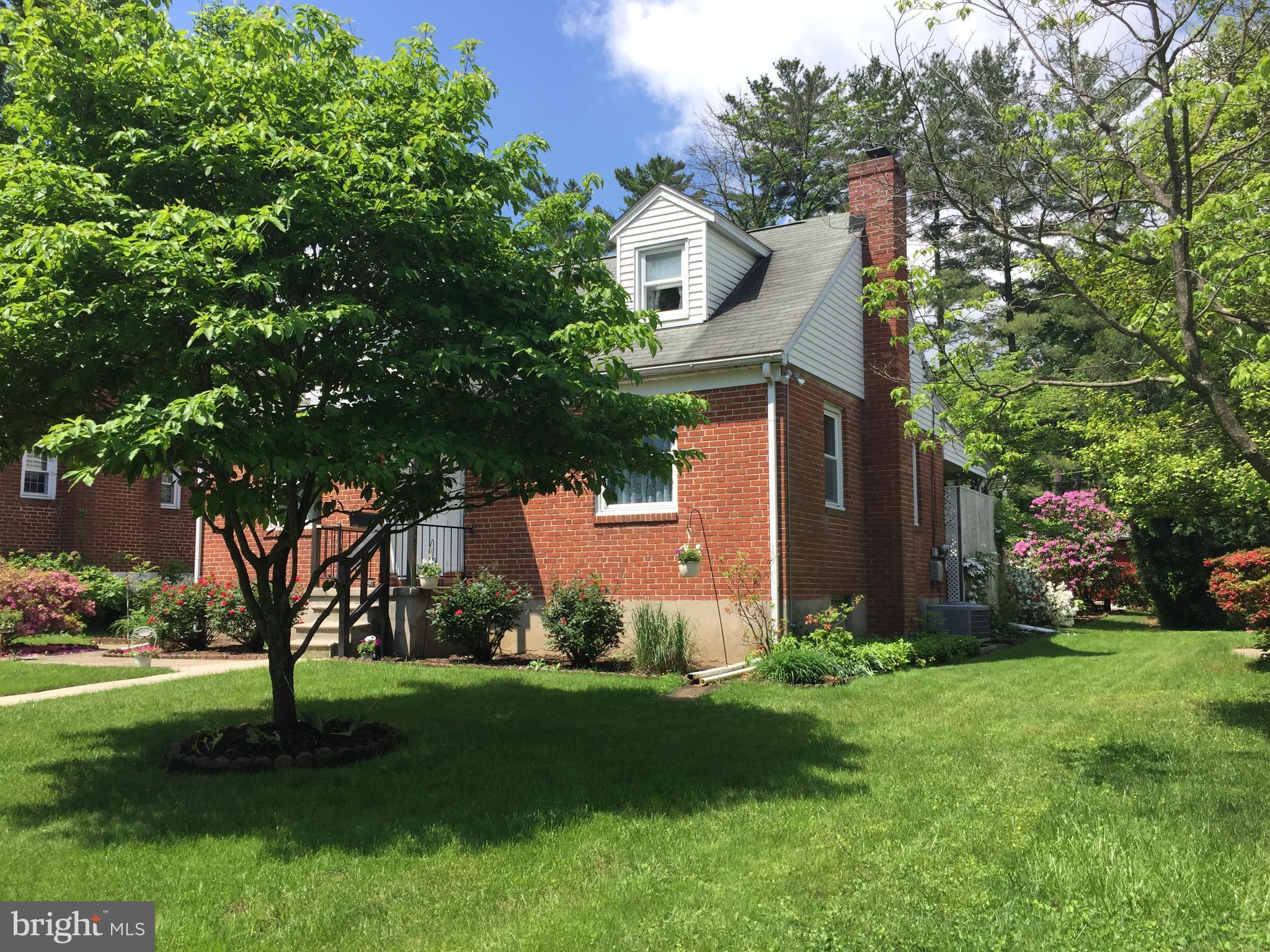 602 Woodside Road Baltimore, MD 21208 - Photo 9 of 30 Enjoy the garden swing