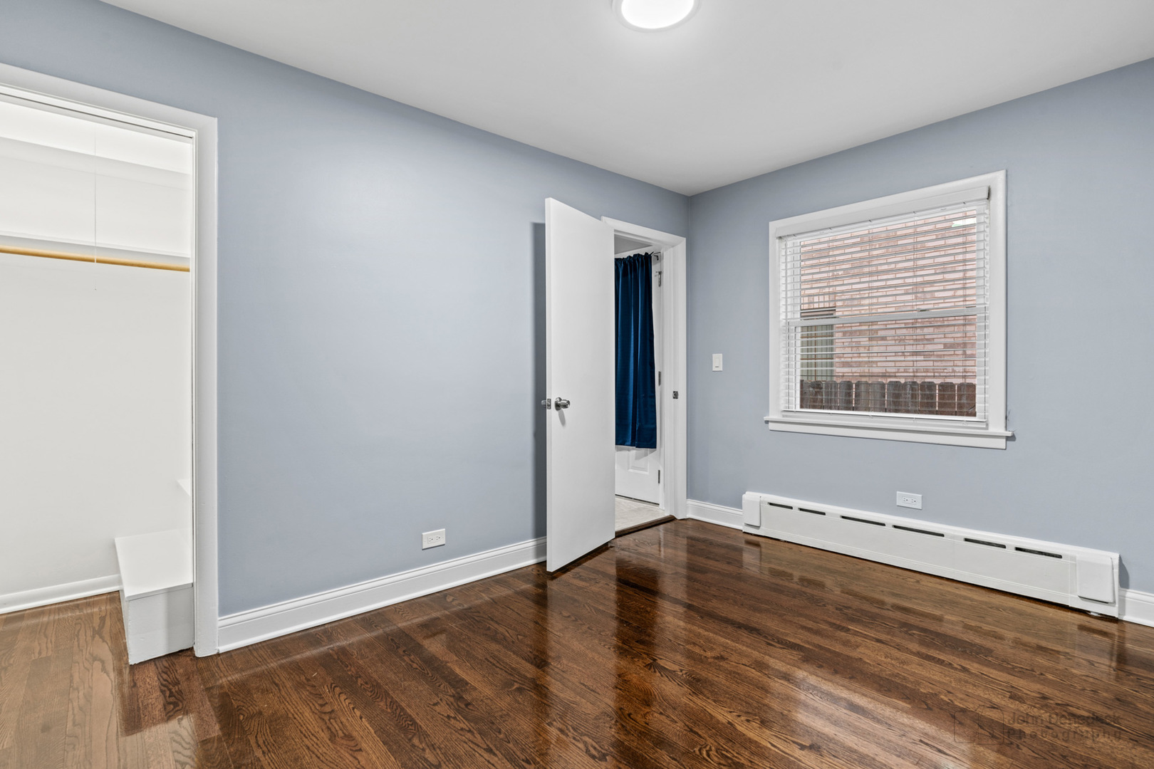 2170 Douglas Avenue Des Plaines, IL 60018 - Photo 11 of 21 an empty room with wooden floor and windows