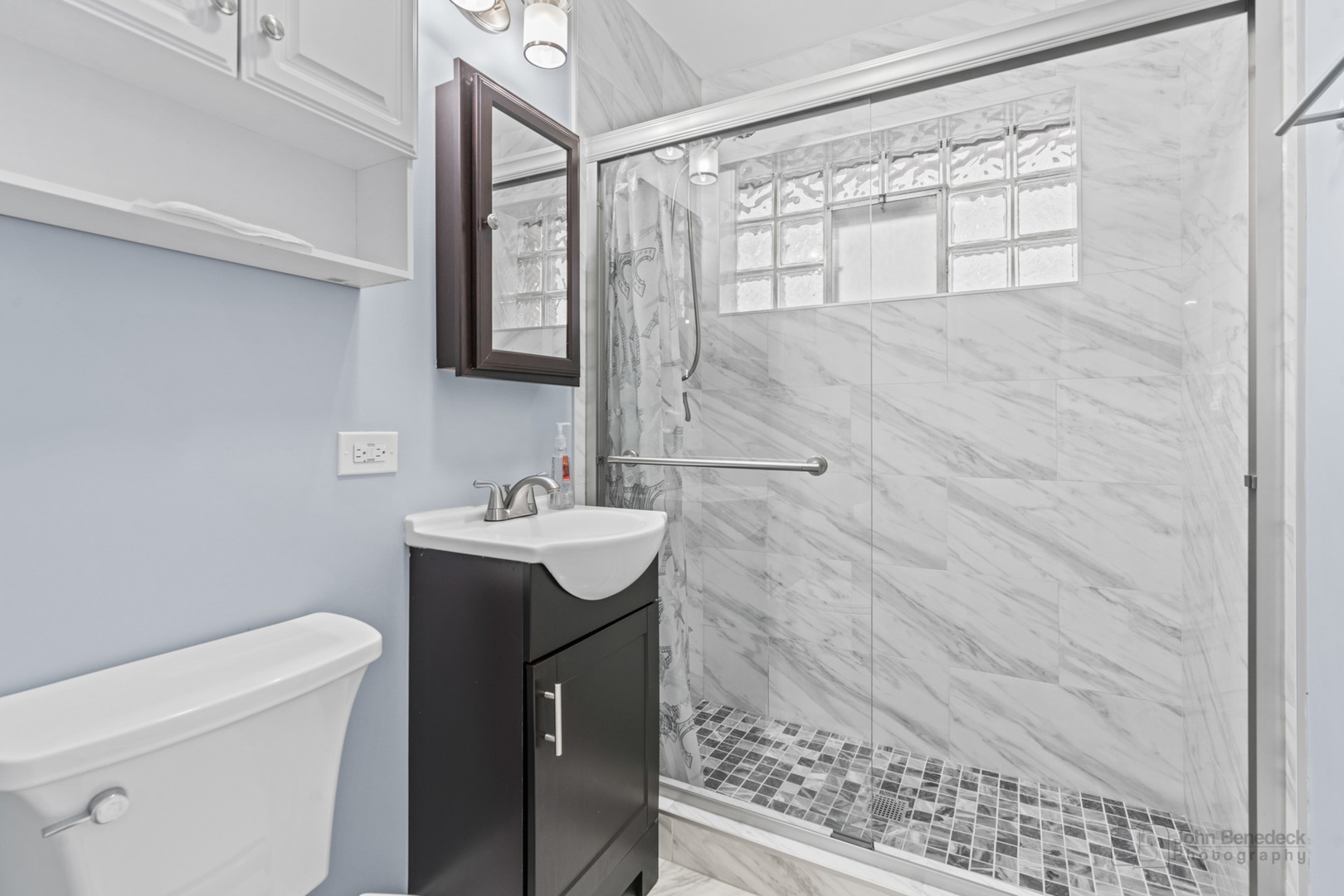 2170 Douglas Avenue Des Plaines, IL 60018 - Photo 14 of 21 a bathroom with a sink a toilet and shower