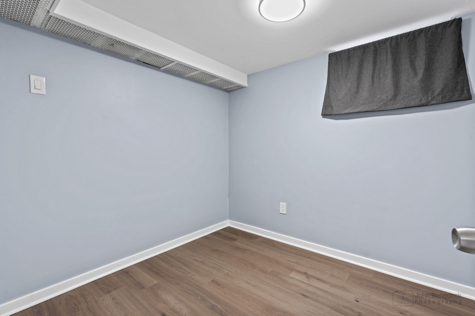 2170 Douglas Avenue Des Plaines, IL 60018 - Photo 19 of 21 a view of a small space with wooden floor and a window