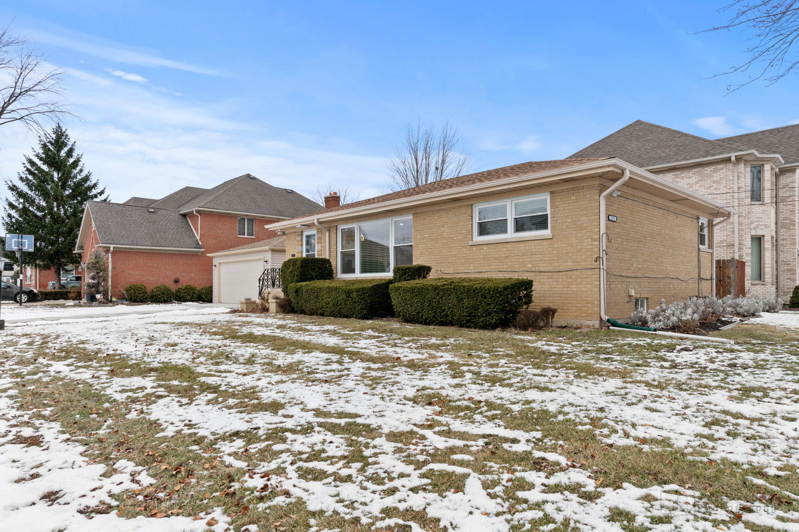 2170 Douglas Avenue Des Plaines, IL 60018 - Photo 2 of 21 a front view of a house with a yard