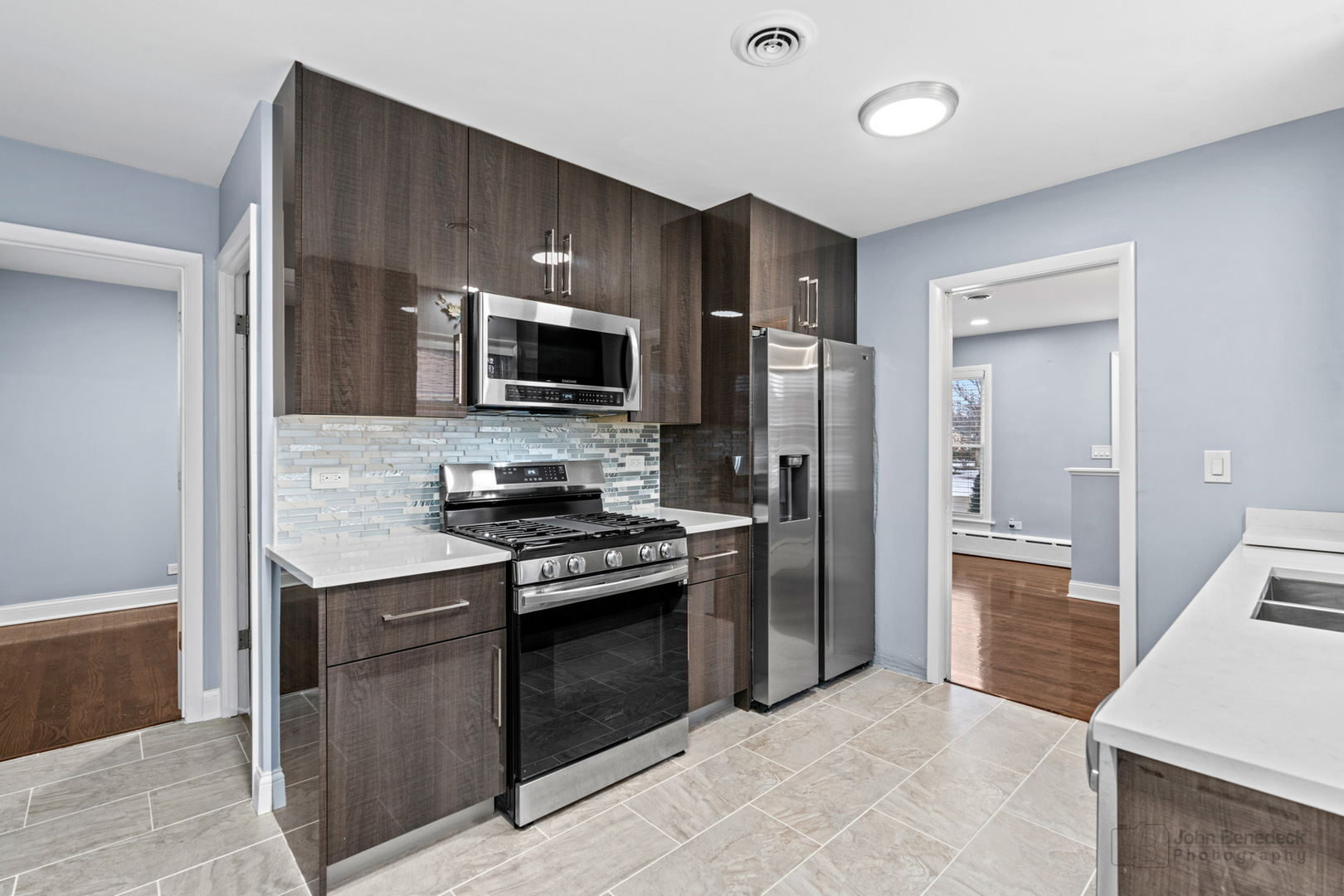 2170 Douglas Avenue Des Plaines, IL 60018 - Photo 9 of 21 a kitchen with stainless steel appliances a stove microwave and refrigerator