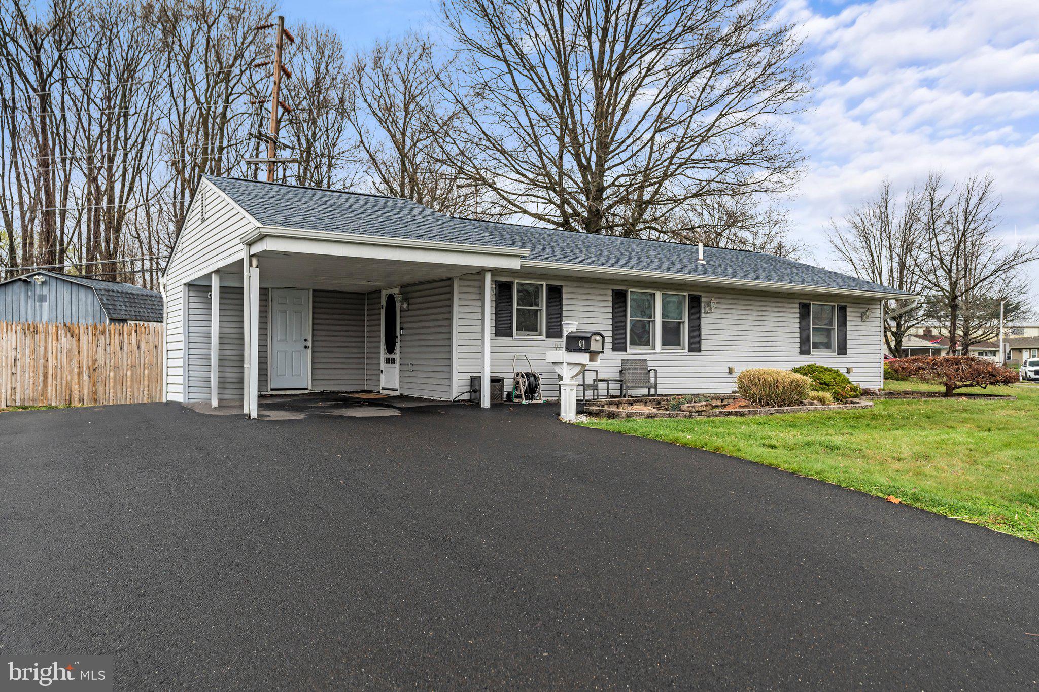 91 Border Rock Road Levittown, PA 19057 - Photo 1 of 20 Exterior Front with Newer Paver Driveway