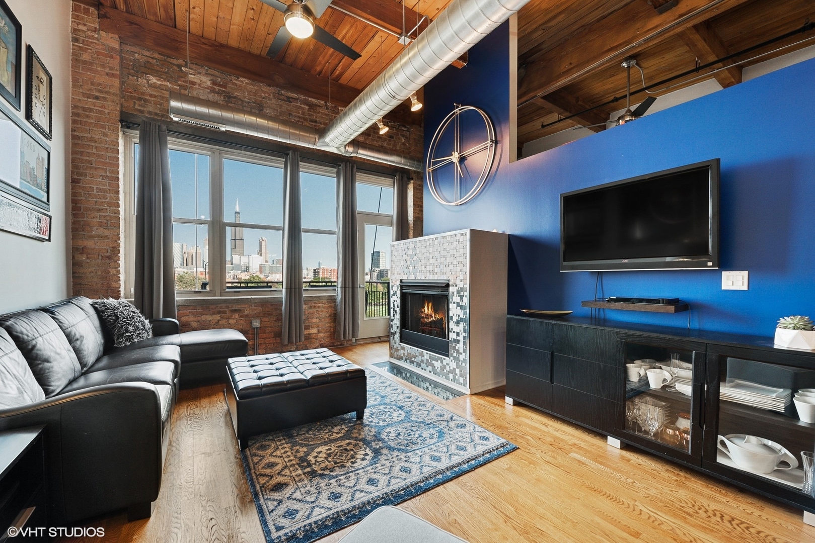 1500 West Monroe Street, Unit 623 Chicago, IL 60607 - Photo 3 of 11 a living room with furniture and a flat screen tv