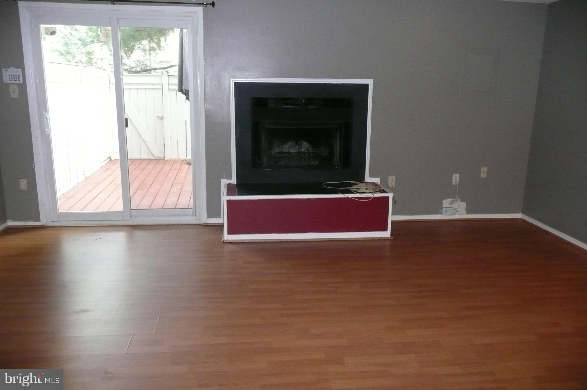 2442 Ridgehampton Court Reston, VA 20191 - Photo 18 of 20 FAMILY/REC ROOM WITH WOOD-BURNING FIREPLACE