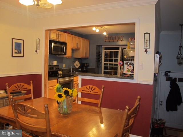 2442 Ridgehampton Court Reston, VA 20191 - Photo 8 of 20 DINING ROOM WITH VIEW OF KITCHEN