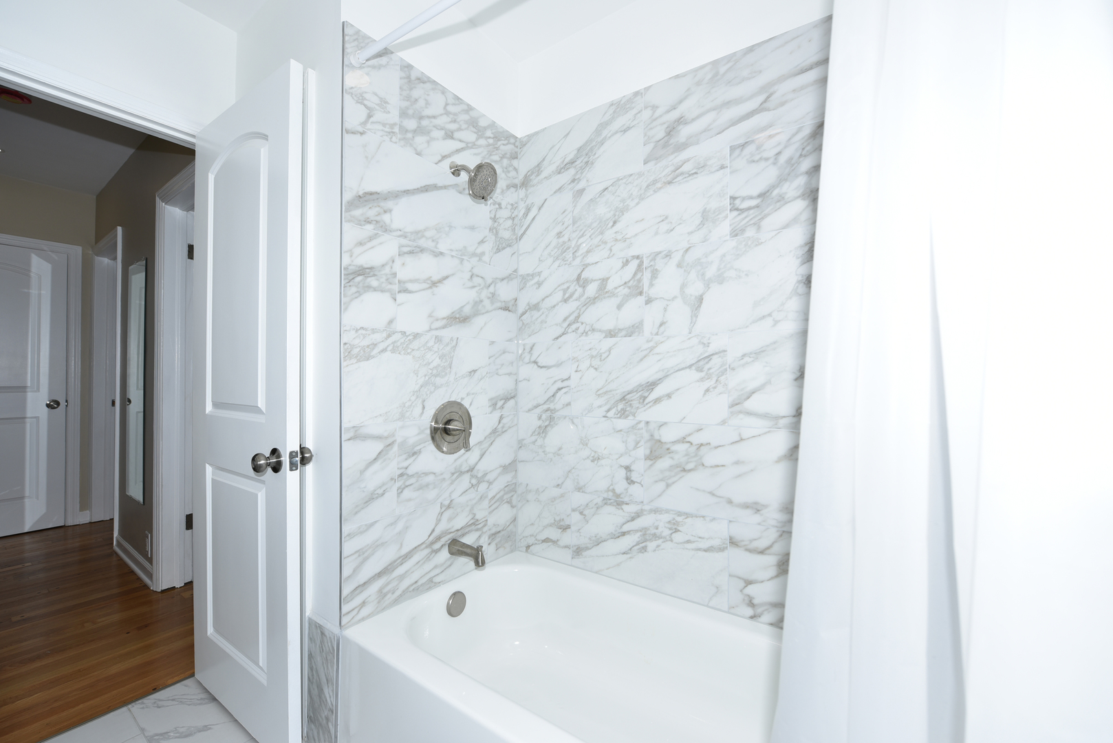 502 Manchester Road Normal, IL 61761 - Photo 11 of 29 a bathroom with a bathtub