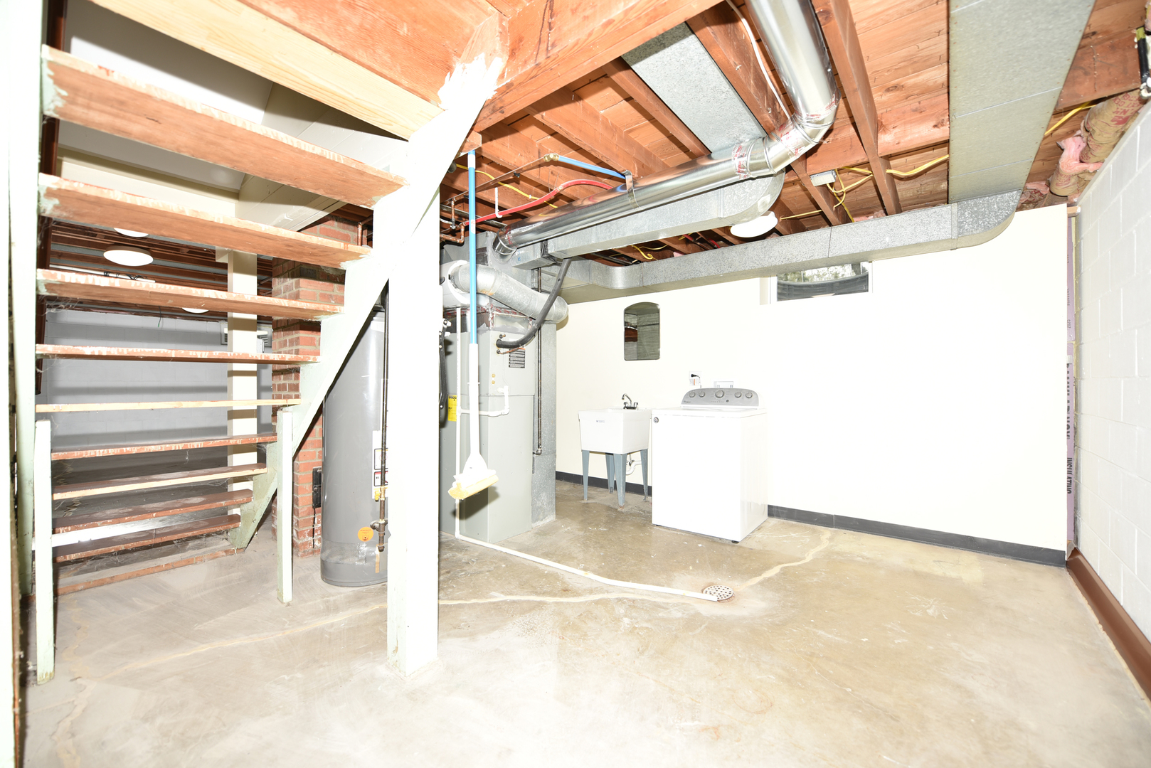 502 Manchester Road Normal, IL 61761 - Photo 23 of 29 a view of a room with wooden floor and windows