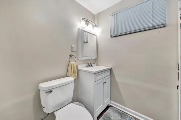 a bathroom with a shower curtain