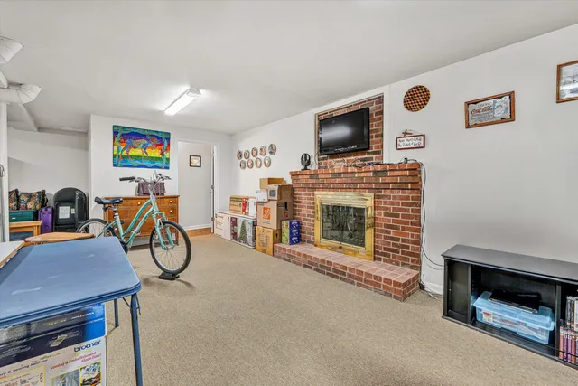 a living room with lots of furniture and a flat screen tv