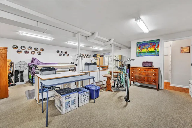 a view of a workspace with furniture