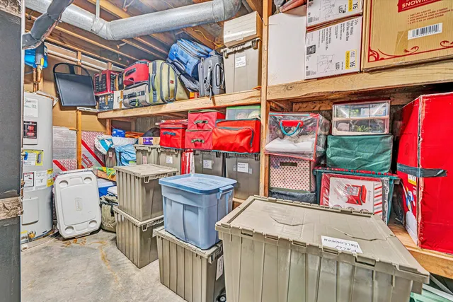 a view of a house with a yard and garage
